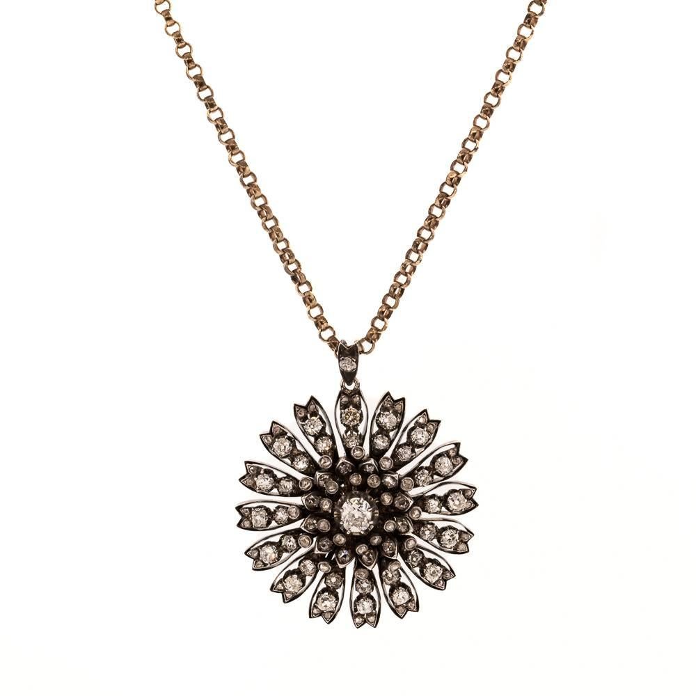 An impressive Victorian Diamond Flower Pendant, set with 5.50 carats of Old European cut and Rose cut diamonds. Pendant measures 1 3/4 inches wide by 2 inches high, suspended from an 18 inches long Victorian link chain. Circa 1840’s

