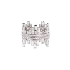 18kt white gold Anniversary ring with baguette and brilliant cut diamonds