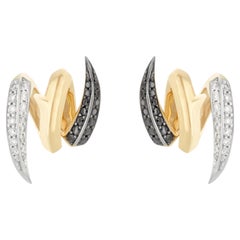 Orecchini a bottone "Thorn Embrace" in oro bicolore 18 carati con diamanti bianchi e neri