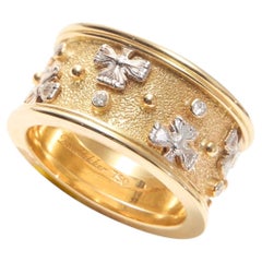 Anello a fascia in oro giallo 18 carati modello Fleuron bicolore