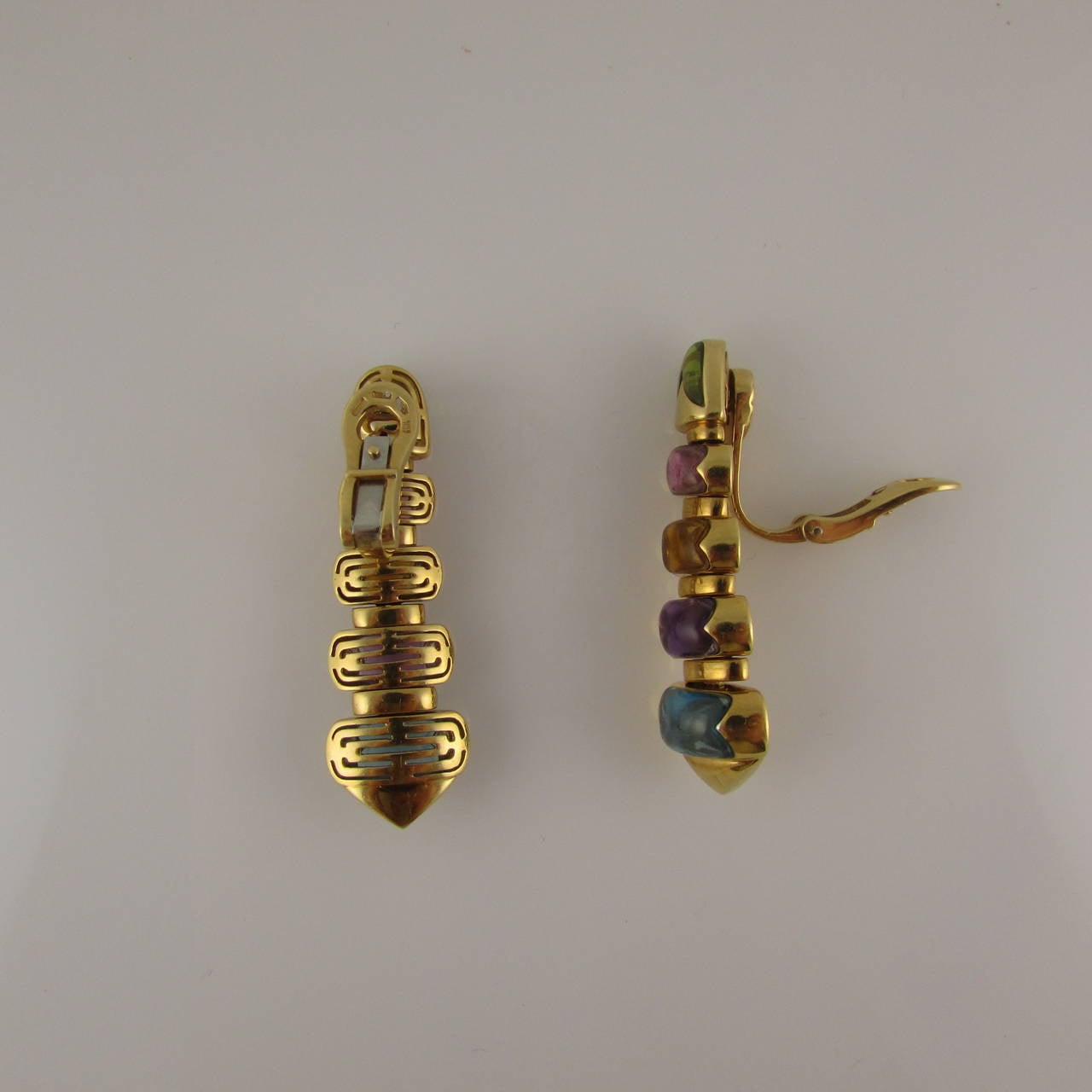 Pair of 18KT yellow gold and cabochon semi-precious “Celtica” drop earrings by Bvlgari. Clip backs, no posts. c1990s. Bulgari no longer makes these earrings.