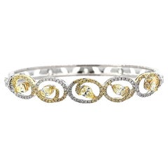 Brazalete de pavé y diamantes pera champán de Dilys, oro blanco de 18 quilates