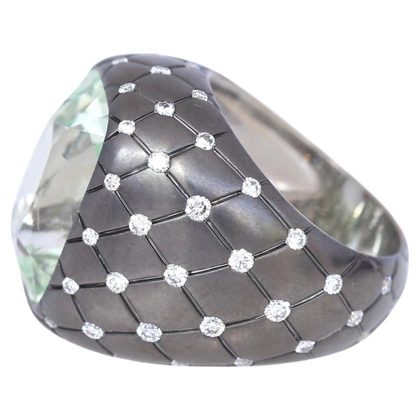 16.9 Carat Chrysoberyl Diamond Gold Ring.
Center stone Chrysoberyl weighting 16.94 Ct on a wide-band engraved with lattice design accented with brilliant-cut Diamonds. Originally purchased on a Sotheby’s auction London. 1990. A very unusual and