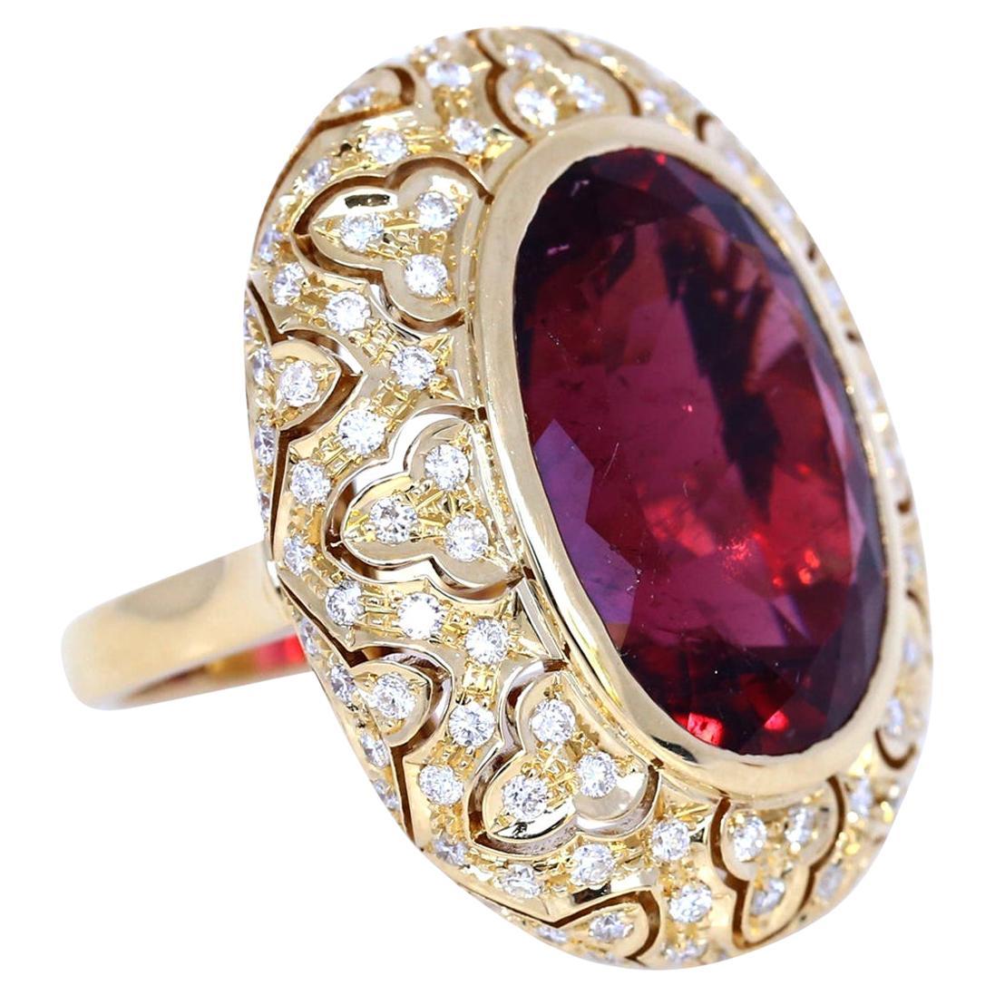 Massive Tourmaline 33Ct Yellow 18K Gold Diamonds Ring. 
Looks perfect on hand, attracts attention and yet does not look heavy. A very sophisticated design. 
Exceptional craft quality.  The stone has a very deep and rich color which suites perfectly