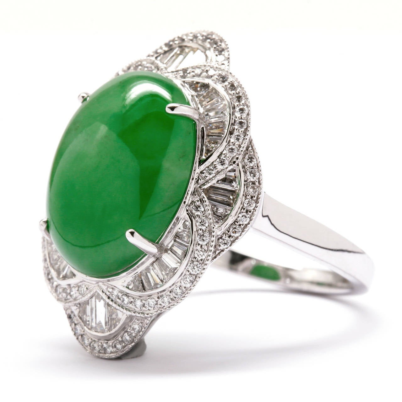 Incredible 7.70ct Jadeite and Diamond(.85ctw) 18kwg Ring. This Jade Cabochon is 14.94x11.69mm and is Certified by the AGTA 94019303.