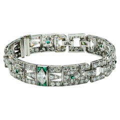 Antikes Art-Déco-Armband aus Platin mit einem natürlichen Diamanten von 5,50 Karat und einem grünen Smaragd