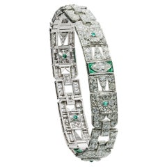 Antikes Art-Déco-Armband aus Platin mit einem natürlichen Diamanten von 5,50 Karat und einem grünen Smaragd