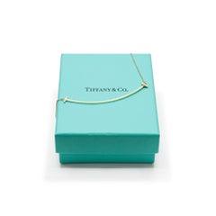 Tiffany & Co. T. 18 Karat Yellow Gold Large Smile Pendant Necklace