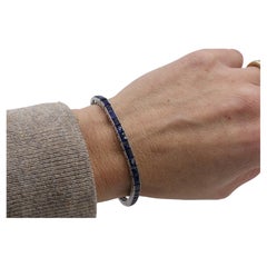 Bracelet en platine certifié par le GIA, de l'époque, orné d'un saphir bleu taillé à la française