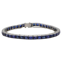 Bracelet en platine certifié par le GIA, de l'époque, orné d'un saphir bleu taillé à la française