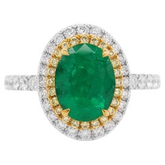 Bague en or 18 carats certifiée en forme d'émeraude colombienne ovale, diamant jaune et tournante