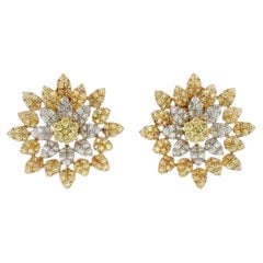 Orecchini con diamanti gialli naturali certificati IGI e diamanti bianchi in oro 18 carati