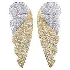 IGI Certified Natural Yellow Diamonds and white diamond earrings in 18K Gold