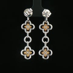 Orecchini contemporanei con diamanti bianchi e di colore "Fancy Color" da 2,79 ct a taglio rotondo, in oro 18 carati