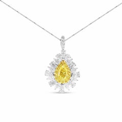 1ct Pear Fancy Intense Yellow Diamond and White Diamond Ring Pendant 18K Gold