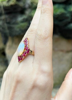 Opal and Ruby Ring set in 18K Gold Settings