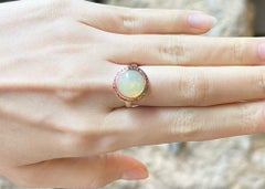 Opal with Fancy Sapphire Ring set in 18K Rose Gold Settings