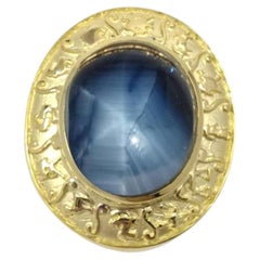 Blue Star Sapphire Ring set in 18K Gold Settings