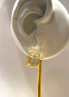 Diamond Earrings set in 18K Gold Settings