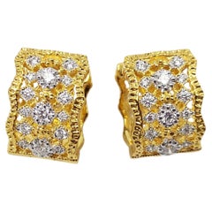 Diamond Earrings set in 18K Gold Settings