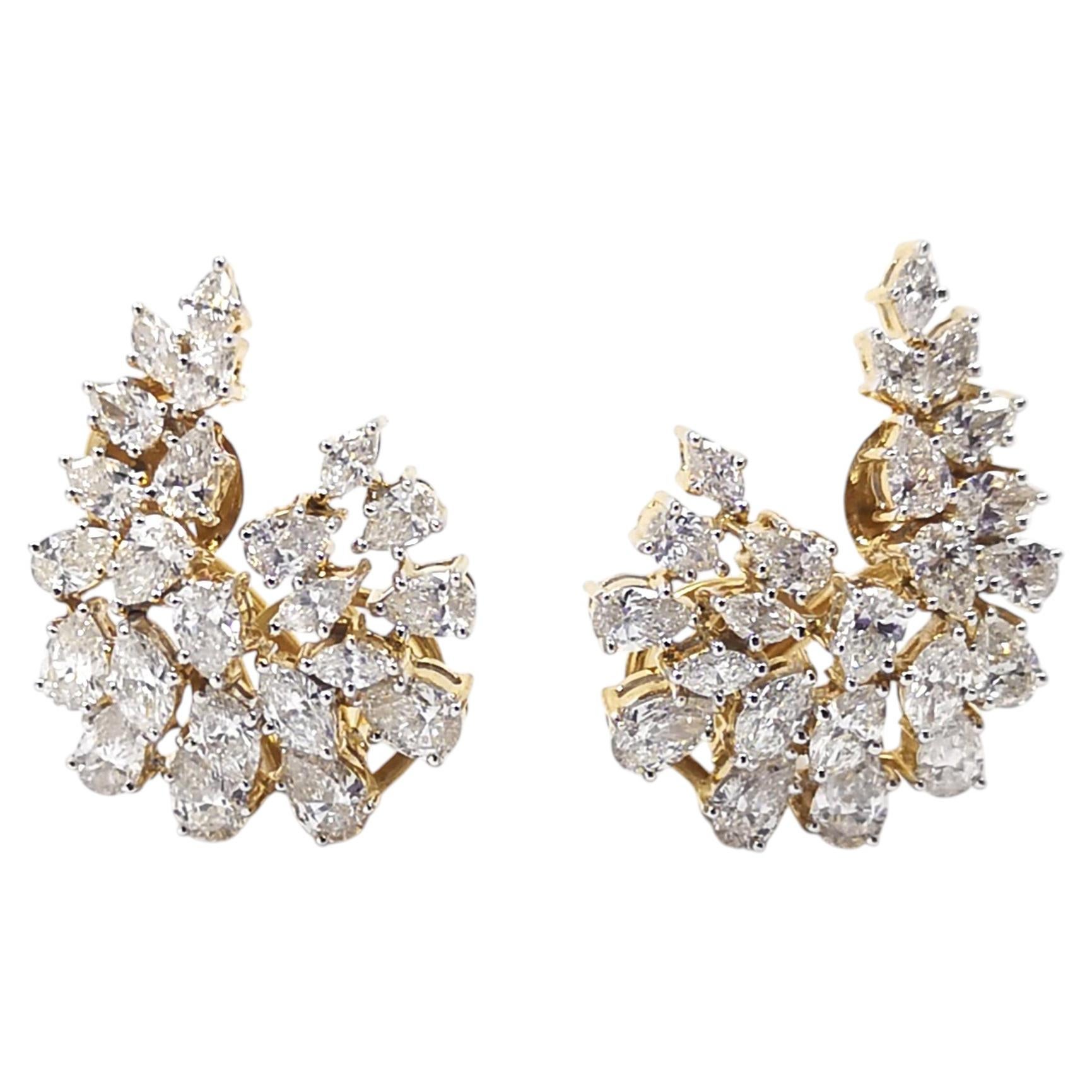 Diamond Earrings set in 18K Gold Settings