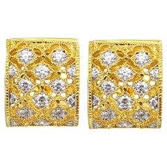 Diamond Earrings set in 18K Gold Settings