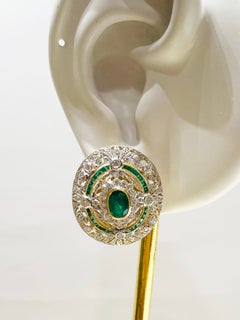 Emerald with Diamond Earrings set in 18K Gold Settings