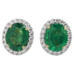 Emerald with Diamond Earrings set in 18K Gold Settings