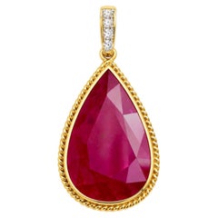 Ruby with Diamond Pendant set in 18K Gold Settings