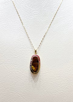 Fire Agate with Fancy Sapphire Pendant set in 18K Gold Settings