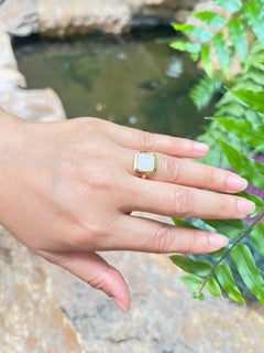 Jade Ring set in 18K Gold Settings