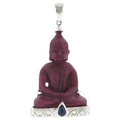 Carved Ruby with Cabochon Blue Sapphire Buddha Pendant set in 18K White Gold