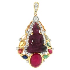 Carved Ruby, Cabochon Ruby and 8 Gems, Diamond Buddha Pendant set in 18K Gold
