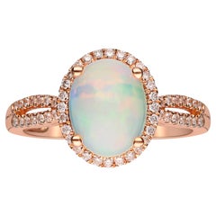 Vintage 1.14 Carat Ethiopian Opal and Diamond 14 Karat Rose gold Ring