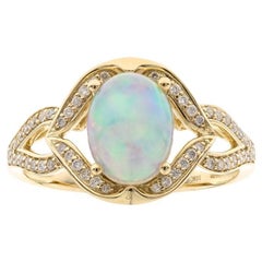 1.40 Carat Oval-Cab Ethiopian Opal Diamond Accents 10K Yellow Gold Ring