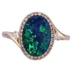 14K Oval Blue-Green Australian Doublet Opal Halo Ring