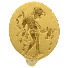 Museum quality Ancient Greek gold ring with Apollo, circa 4th century BC. 12