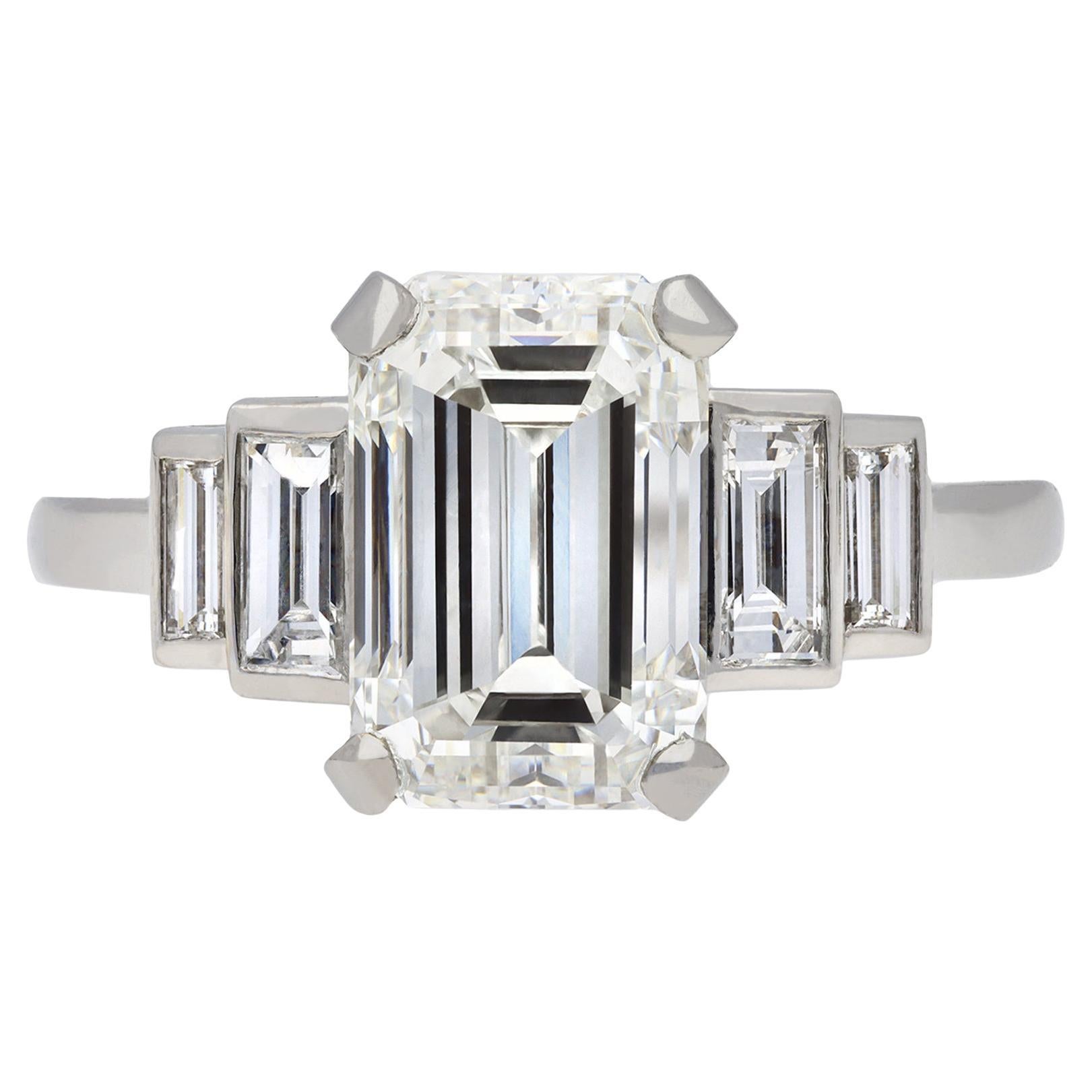 Art Deco Flanked Solitaire Diamond Ring, Circa 1925 For Sale