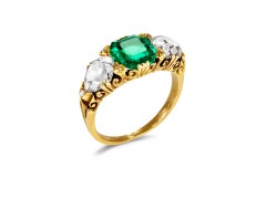 Victorian Colombian emerald & diamond carved three stone ring, English, c. 1890.