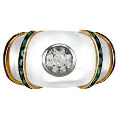 Anillo vintage de René Boivin con diamantes, esmeraldas y rubíes engastados en cristal de roca, de alrededor de 1950.