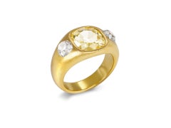 3.81 carat fancy intense yellow diamond ring.