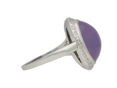 Purple star sapphire and diamond ring by J. Milhening Inc., early 20th Century.