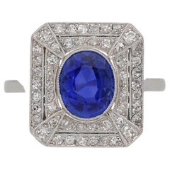 Ceylon sapphire and diamond octagonal cluster ring, French, early 20th Century.