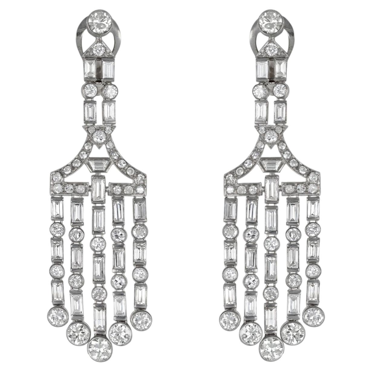Art Deco chandelier diamond drop earrings, early 20th Century. For Sale