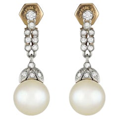 Ohrringe mit Naturperlen und Diamanten, Anfang des 20. Jahrhunderts.