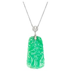 J.E. Caldwell carved jade pendant, American, circa 1925.