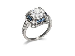 3.13 carat Old cut diamond and sapphire cluster ring, early 20th Century.
