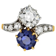 Sapphire and diamond crossover ring, French, early 20th Century.