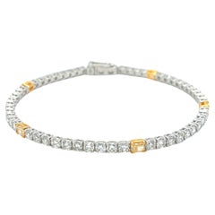 Tennis Bracelet 18kt Gold with 5.88 carats Natural Fancy Yellow & white Diamonds