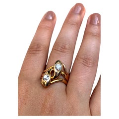 Spettacolare anello a doppio serpente in oro giallo 14 carati con diamante Art Nouveau